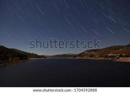 Magnificent night view of the Burguillo reservoir. Popular tourist attraction. Cinematic scene in the middle of nature, located in the Ávila area. The world of beauty.