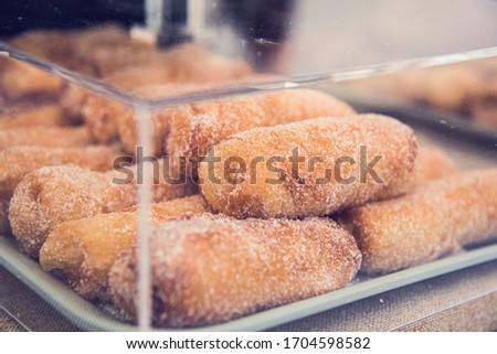Delicious catalan pastry filled with cream (xuixo) 
