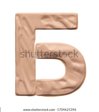 Stencil letter B of the Cyrillic alphabet made by using a cosmetic product on a white background.