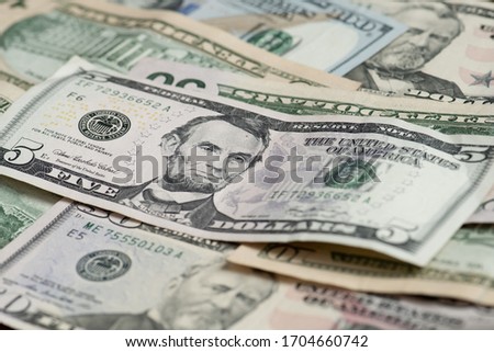 Different banknotes of american dollars