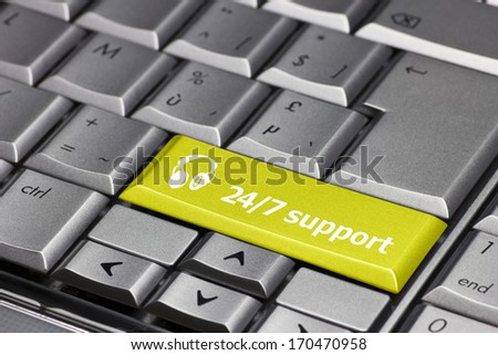Computer key yellow - 24/7 support with headphone icon