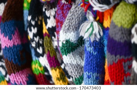 Group of colorful woven winter hats