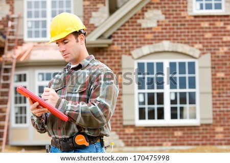 Construction: Home Inspector Reviews Documents. Royalty-Free Stock Photo #170475998