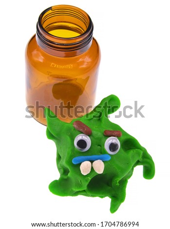 corona virus toy and medicine bottle
