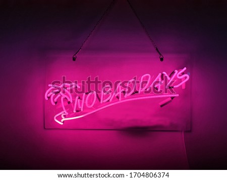 Neon sign phrase 'No bad days'.
A glowing neon sign that is often used in shop interior design.