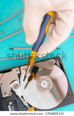 Set of screwdrivers for repair. Computer repair. Computer hard drive.