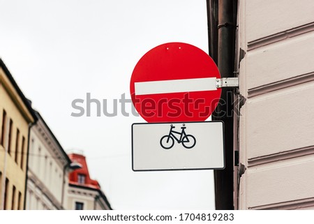 No entry sign for vehicular traffic except bicycles. Road sign against old Europe cityscape. With copy space. Concept environment