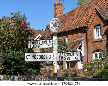 Bucks County road sign at The Lee, Buckinghamshire, England, UK with distances to Swan Bottom, Wendover, Great Missenden, Lee Common and Chesham Royalty-Free Stock Photo #1704831751