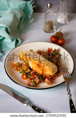 Pan fried cod fish with tomato salsa