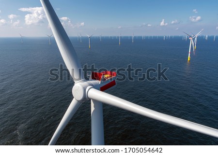 Alternative energy - Aerial view of offshore windmill park at sea