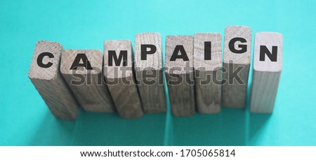 CAMPAIGN word made with building blocks. Marketing advertising smm targeting business concept.