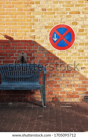                   
parking in front of this bench is prohibited             