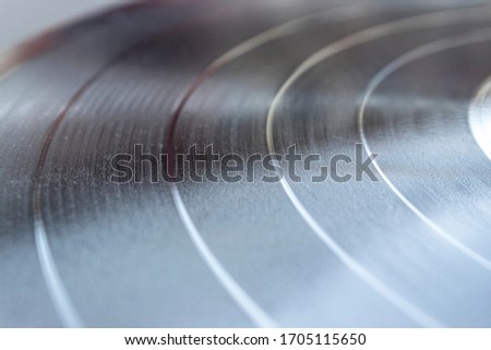 closeup to a black Vinyl Lp disc texture over turntable. music lover concept