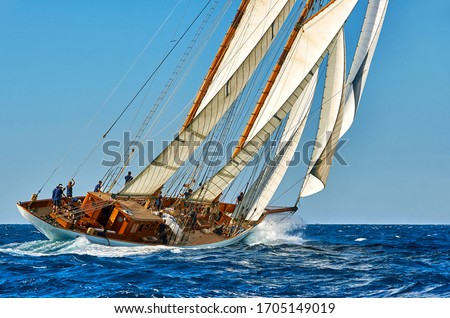 Sailing ship under the sails. Yachting Royalty-Free Stock Photo #1705149019
