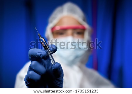 Syringe with vaccine medicament injection for vaccination inoculation cure health and research stuff  Royalty-Free Stock Photo #1705151233