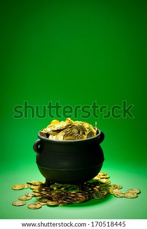 Pot Of Gold: Overflowing Pot On Green Background