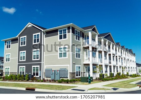 Typical suburban apartment building for rent Royalty-Free Stock Photo #1705207981