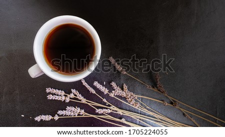 Black coffee and bakery in black background. Healthy breakfast in beautiful set up. coffee lover, 