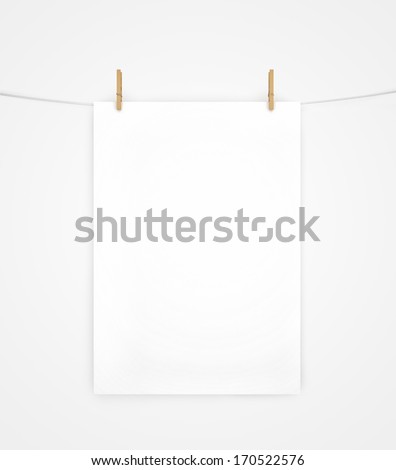 white poster on clothespins