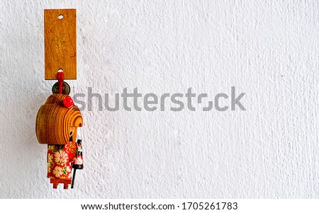 Small hand made hanging dolls as decorations and backgrounds