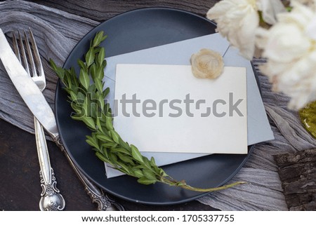 Beautiful spring wedding event table set up mock up with boho style  flowers, leaves decoration and invitation card. Top view flat lay mockup. coral wed