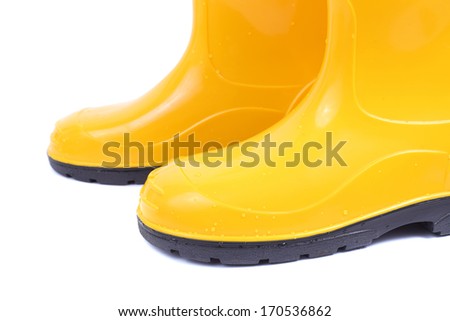 pair of the bright yellow rubber shoes