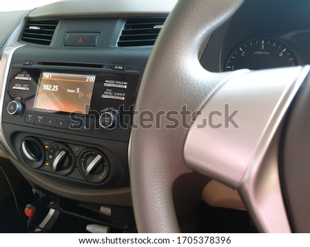 Picture of car dashboard and radio