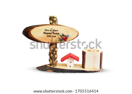 waste wood craft - table showpiece pen stand with message "Nice to Have  Mummy Daddy Like You". Royalty-Free Stock Photo #1705516414