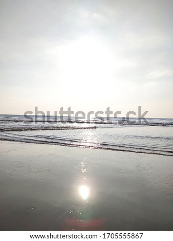 Wonderful Sandy wavy beach with sun