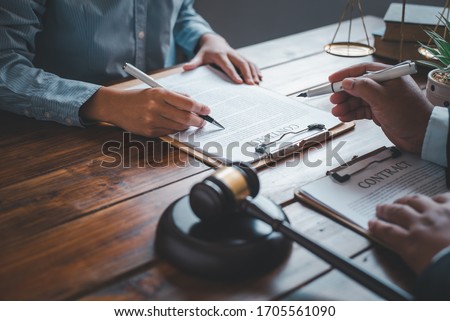 Lawyers give advice about judgment, agreements, justice Customer Royalty-Free Stock Photo #1705561090