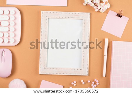 flat lay stationery on work desk in brown pastel background