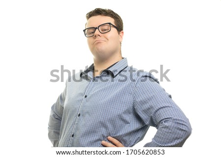 portrait of a handsome young man looking smug	
 Royalty-Free Stock Photo #1705620853