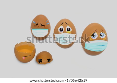 Easter eggs with Corona virus (COVID19) protection concepts. DIY (Do It Yourself) easter eggs wearing mask for Easter holidays decoration. COVID-19 protection. Isolated on white background.