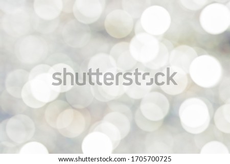 BRIGHT BLURRED LIGHTS BACKGROUND, WHITE BOKEH PATTERN, FESTIVE DESIGN, TWINKLY CIRCLE TEMPLATE
