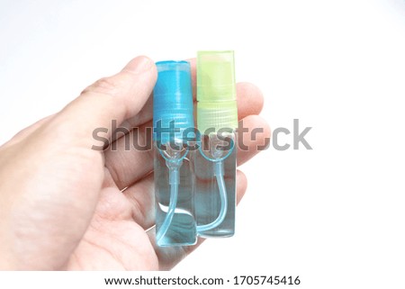 Mini spray bottle of alcohol for using to make cleaning and clear bacteria. Sanitizer to prevent Coronavirus or Covid-19.