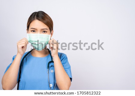 Portrait of young asian nurse wearing surgical mask