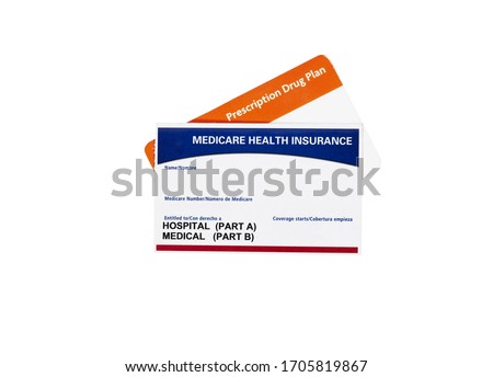 Medicare health insurance card with a prescription drug card isolated on white Royalty-Free Stock Photo #1705819867