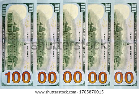 Hundred-dollar bills arranged in a row close-up.The 10 zeros on the bills symbolize 10 billion dollars Royalty-Free Stock Photo #1705870015