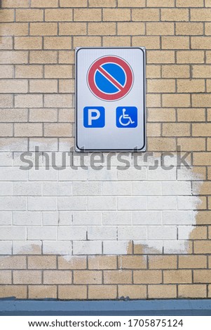Disabled Only Parking Traffic Sign at Wall