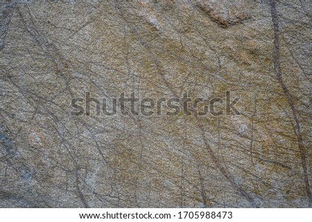 Floor and wall coverings in the form of natural stone with streaks