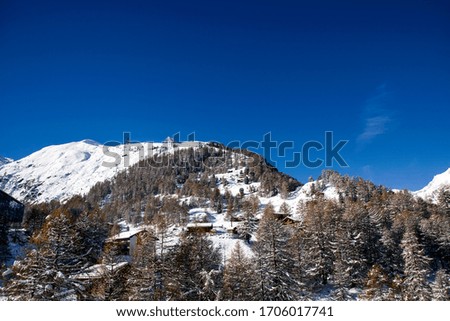 Swiss mountains covered in snow at winter