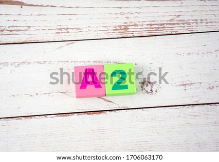 "A2"-the words on wooden cubes.  A background image of english words on colorful building blocks.