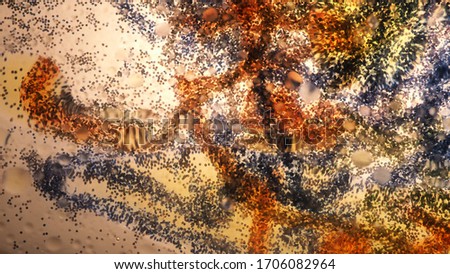 Mixing water and oil, beautiful colors. Close-up. Abstract background of filaments of different colors. Water and oil bubbles. Abstract light illumination