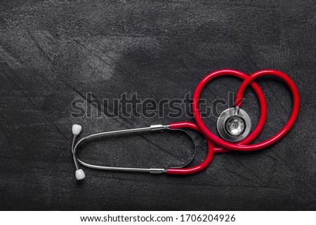 Stethoscope On A grey Background, with Copy Space