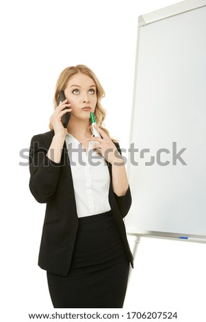 Calling woman in front of the whiteboard