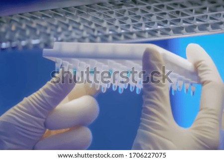 Abstract, blurry, bokeh background, image for the background. Laboratory research searching for a vaccine against coronavirus.