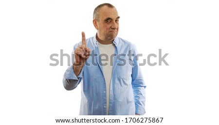 Man saying no by waving his finger on white background.