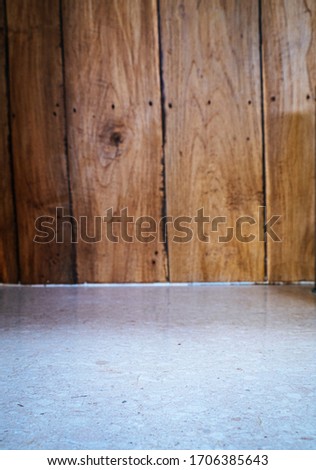 Background texture for Mock up with marble stone floor and a wooden timber plank wall
