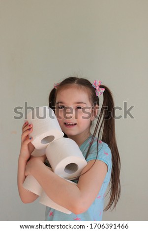 Funny girl with a stock of toilet paper photo fun