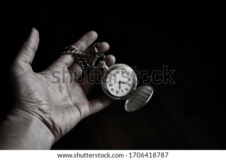 Pocket watch in black and white